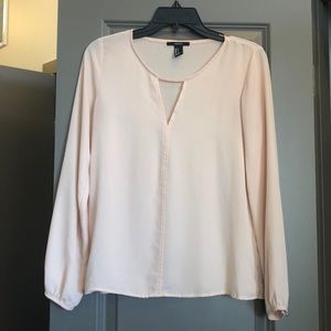 Peach colored blouse